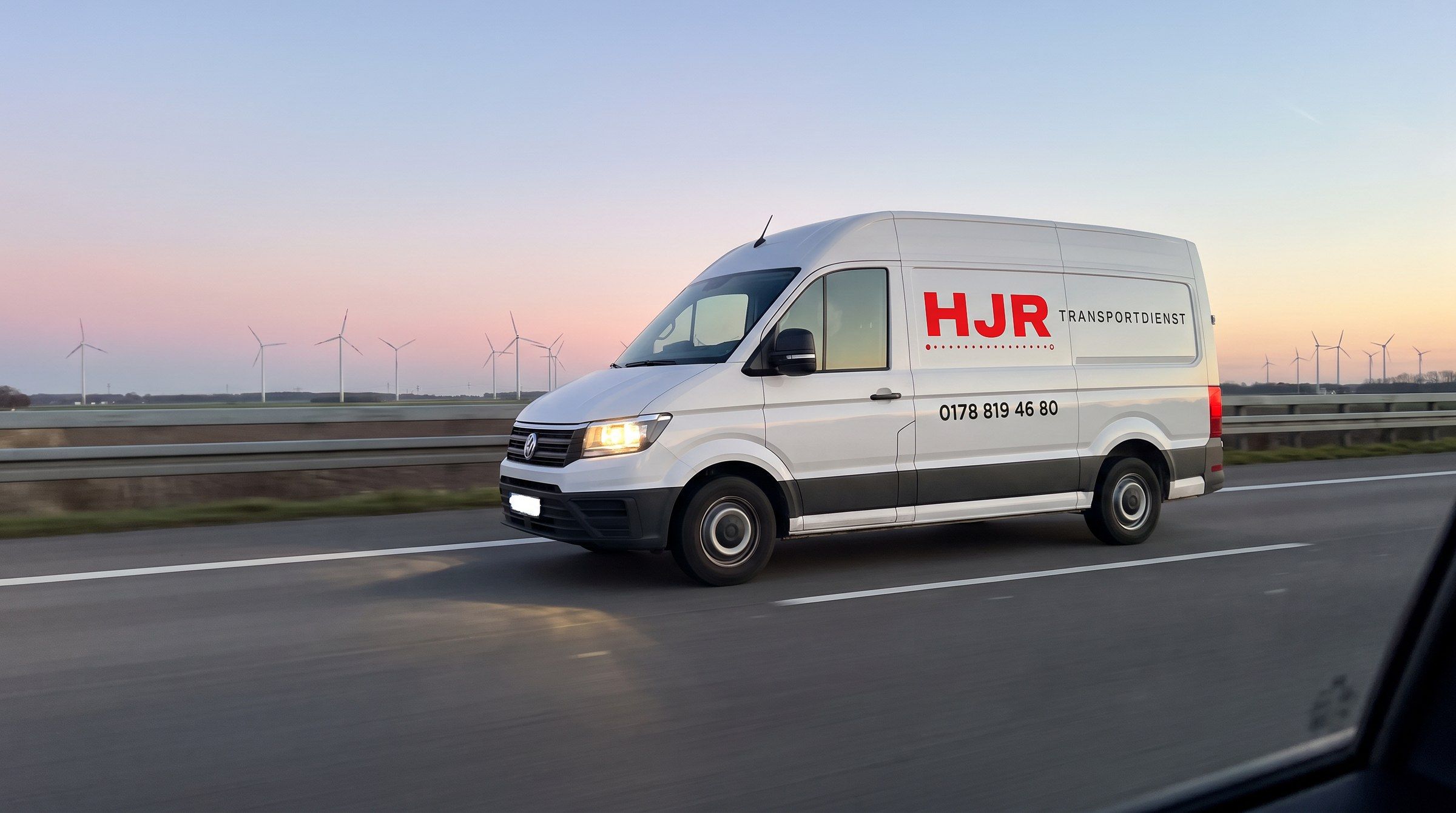 HJR van on the motorway near Hannover at dusk